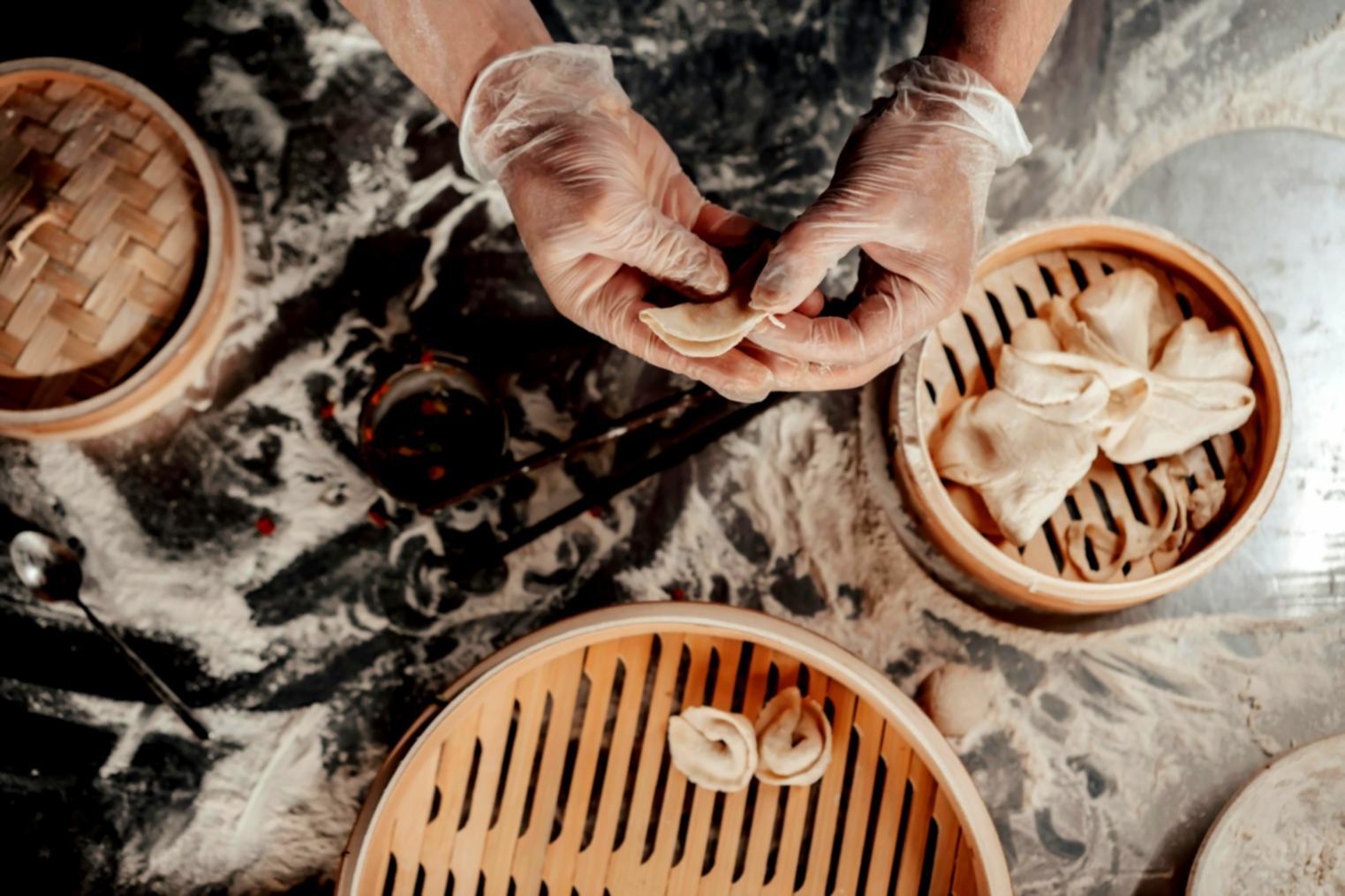 Wood-fired pizza oven heating up for event service